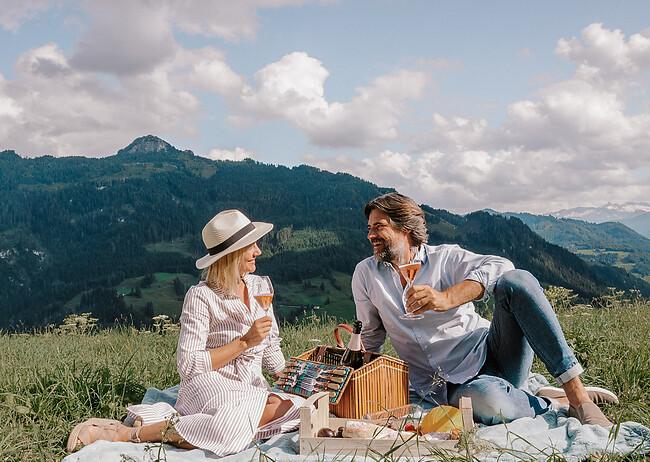 [Translate to Englisch:] Picknick in den Bergen