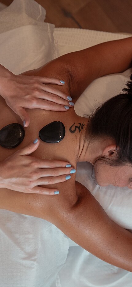 Hot stone massage at the Wellness Hotel salzburg DAS EDELWEISS near Salzburg in the Beauty Mountain Spa