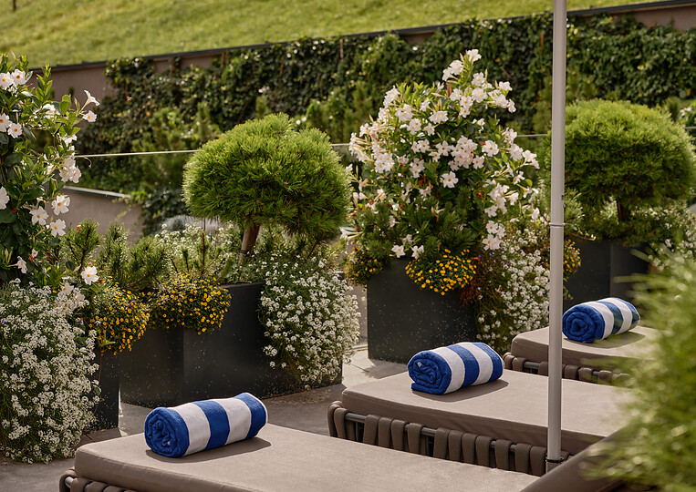 Blue striped towels outside the hotel austria