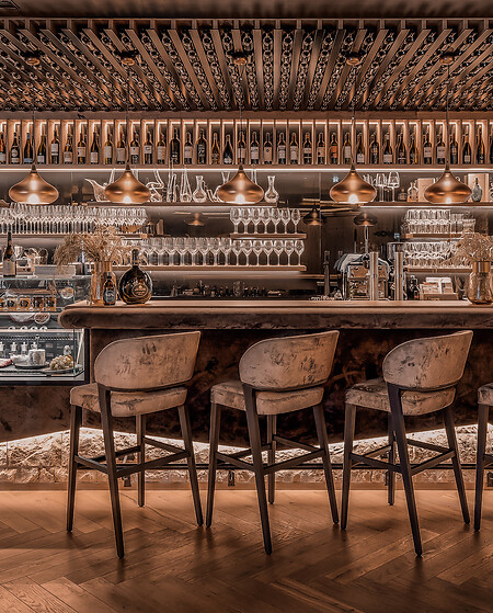 Wine bar interior with elegant chairs in DAS EDELWEISS