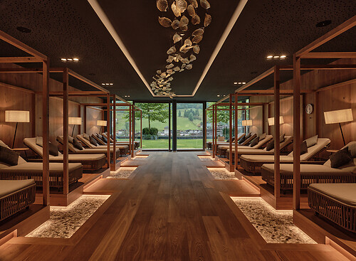 Relaxation room with mountain views of the Adults Only Spa Hotel Austria