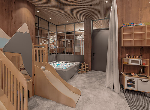 Children's area and playground at the hotel with slide in the Luxuary family hotel Austria
