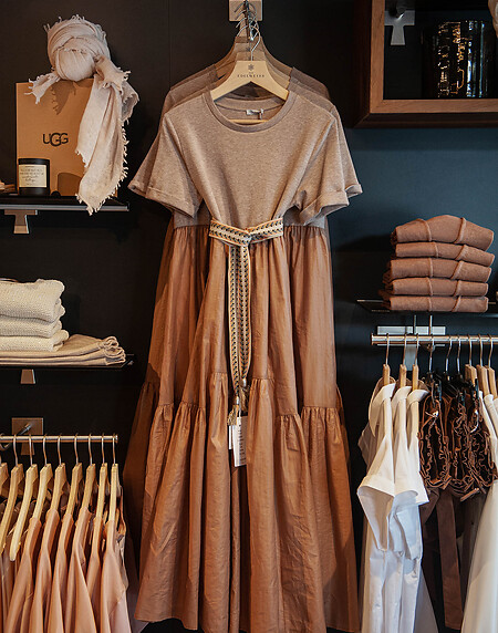 Dresses by Kinga Mathe, Moncler, Bogner, Tom Ford, Perfect Moments, and Goldbergh